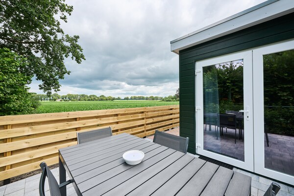 De Weide: stijlvol vakantiehuis met omheinde tuin in bosrijk Drenthe - thumbnail 6
