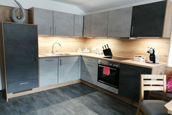Modern appartement in Aschau met weids uitzicht op de Gerlossteinwand - thumbnail 5