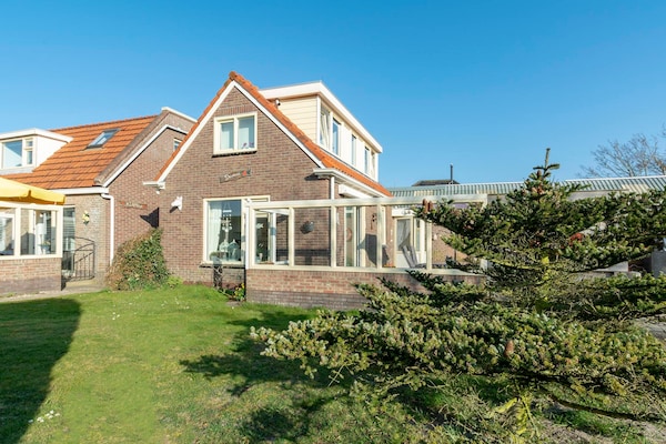 Duinroos: Gezellige bungalow op loopafstand van strand en duinen - thumbnail 1