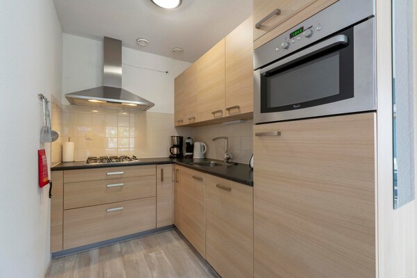 Modern appartement op loopafstand van het strand in Julianadorp aan Zee - thumbnail 4
