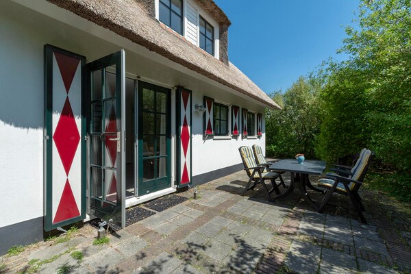 Lichte villa met omheinde tuin op 900m van het strand in Callantsoog - thumbnail 6