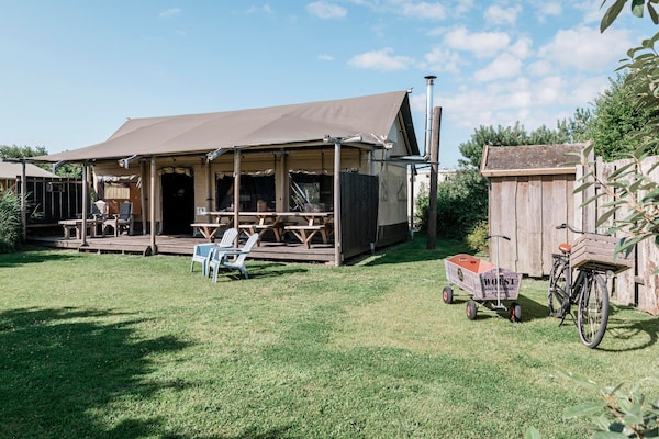 Wood Lodge Luxe: sfeervol vakantieverblijf voor 8 personen in Callantsoog - thumbnail 1