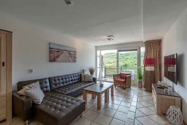 Wijde Blick 211: Modern appartement met duinuitzicht, 250m van strand - thumbnail 1