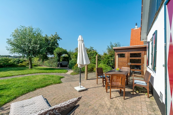 Luxe rietgedekte villa aan het water met duinuitzicht in Callantsoog - thumbnail 5