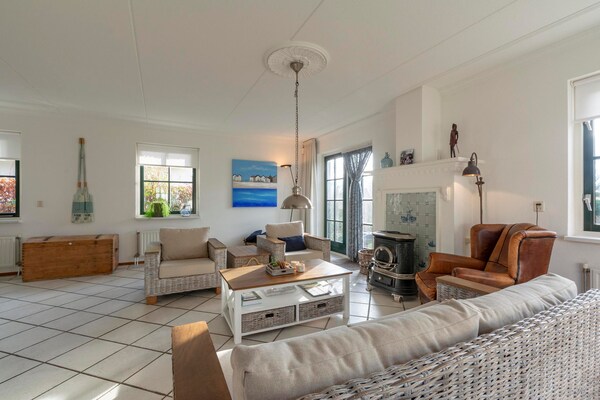 Luxe rietgedekte villa aan het water met duinuitzicht in Callantsoog - thumbnail 6