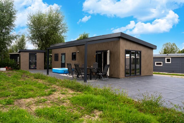 Knus vrijstaand vakantiehuis in Brabant met omheinde tuin aan de golfbaan - thumbnail 6