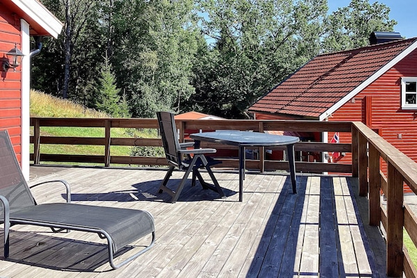 Klassiek rood vakantiehuis bij het meer in Dalsland, Zweden - thumbnail 6