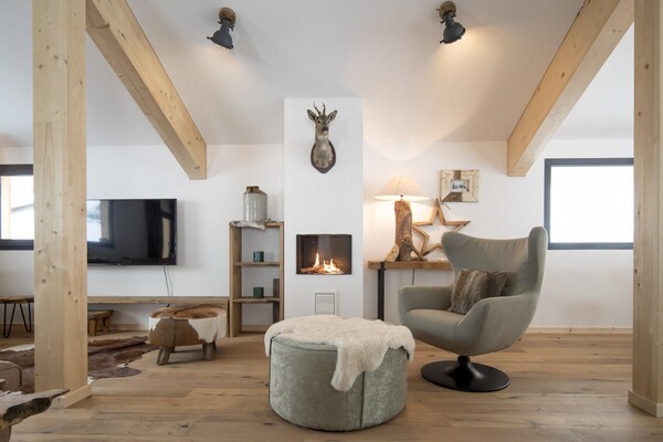 Chalet met privésauna en bubbelbad direct aan de skipiste in Schladming - thumbnail 2