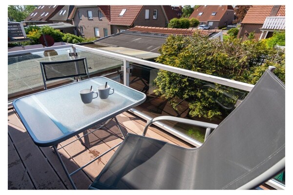 Licht appartement met balkon op loopafstand van de dijk in Norddeich - thumbnail 2