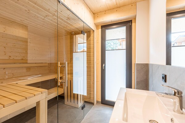 Appartement met privé-spa, sauna & verwarmd zwembad op 240m van de skilift - thumbnail 4