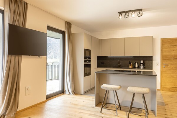 Modern appartement aan de golfbaan met bergzicht en wellness in St. Martin - thumbnail 5