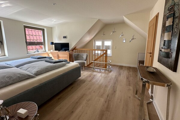 Gerenoveerd 4-sterren appartement in oud vissershuis – centrum Warnemünde - thumbnail 6