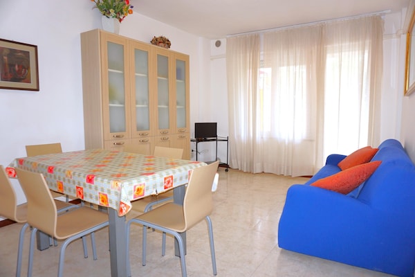 Licht appartement op 50 meter van zee met gedeelde tuin in Porto Santa Margherita - thumbnail 2