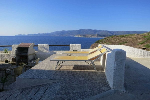 Appartement met panoramisch zeezicht en privéterras in Magomadas - thumbnail 1