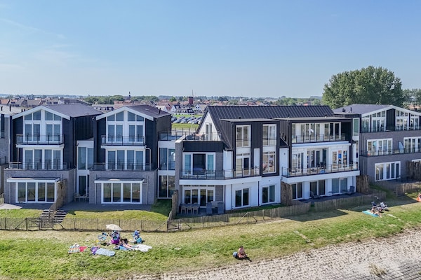 Luxe appartement Vista Maris 'Laguna Beach House' aan de Oosterschelde - thumbnail 1