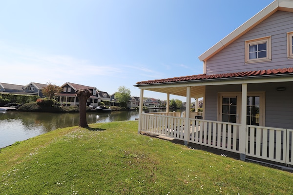 Vrijstaand vakantiehuis aan het water met sauna en aanlegsteiger bij Rotterdam - thumbnail 1