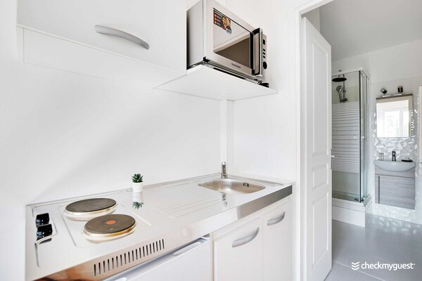 Compacte studio in Parijs: knusse luxe bij Parc Georges Brassens - thumbnail 4