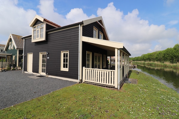 Knus vakantiehuis aan het water in Simonshaven met eigen veranda - thumbnail 2