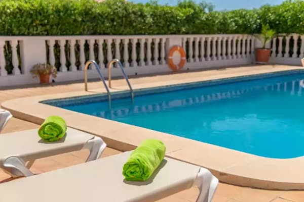 Gezellig appartement met gedeeld zwembad aan de golfbaan in Cala en Porter - thumbnail 4