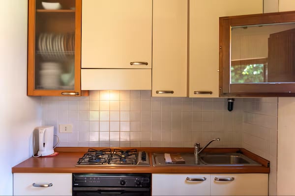 Licht appartement in Laterina met zwembad, tuin en uitzicht op Toscaanse heuvels - thumbnail 3