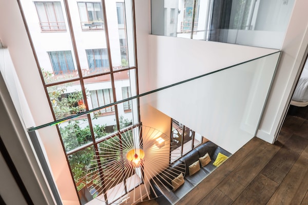 Licht duplex loft met privé terras nabij Place de la Bastille - thumbnail 3