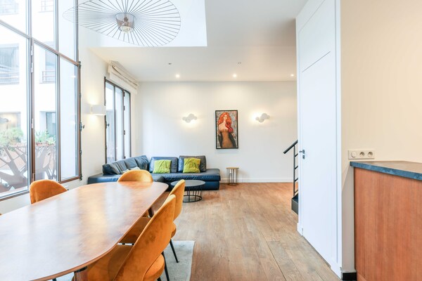 Licht duplex loft met privé terras nabij Place de la Bastille - thumbnail 4