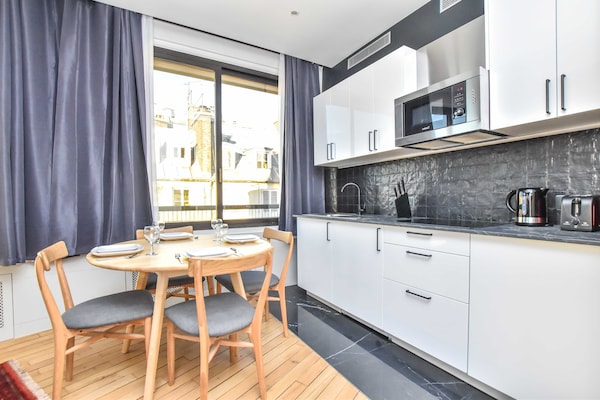 Licht appartement met airco in het 9e arrondissement, vlak bij Opéra Garnier - thumbnail 3