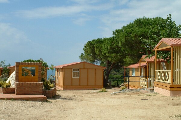 Camping Rocagrossa: Gezellige bungalow op 50m van het strand in Calella - thumbnail 4