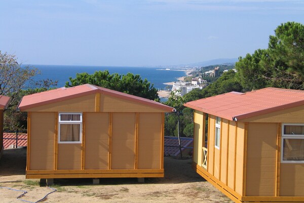 Camping Rocagrossa: Gezellige bungalow op 50m van het strand in Calella - thumbnail 5