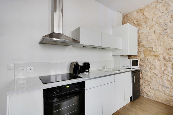 Licht appartement 35m² tussen Halles en Sentier, dichtbij het Louvre - thumbnail 3