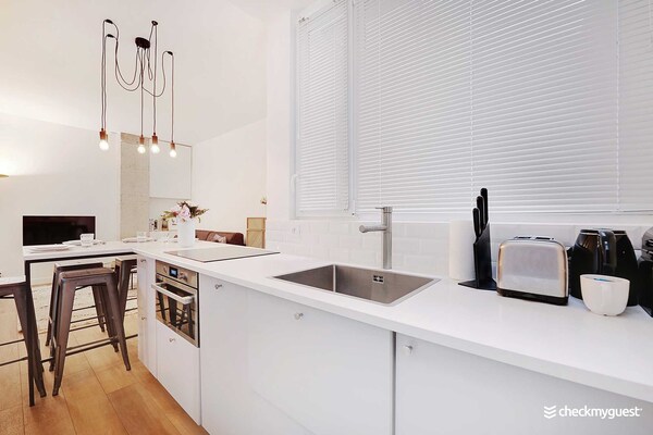 Licht appartement met 2 slaapkamers in levendig Oberkampf, vlakbij Place de la République - thumbnail 6