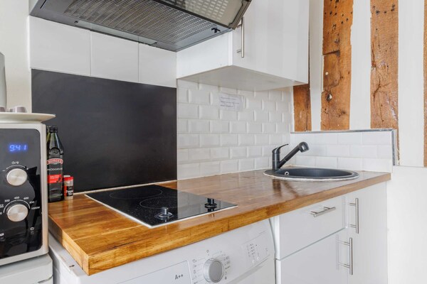 Charmant duplex appartement in trendy wijk Mail, nabij Place des Victoires - thumbnail 3