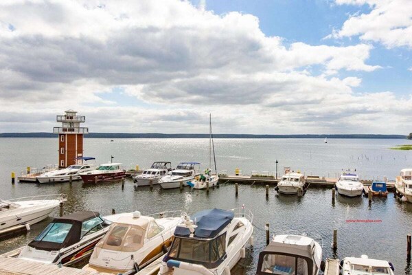 Exclusief appartement aan de jachthaven met panoramisch uitzicht over de Plauer See - thumbnail 1