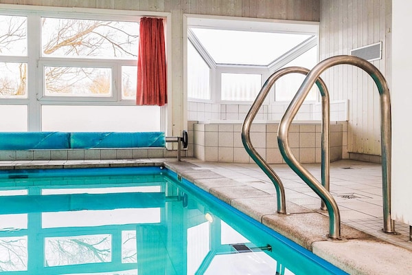 Luxe Scandinavisch vakantiehuis met privézwembad en sauna aan de golfbaan - thumbnail 5