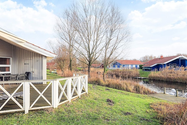 Vrijstaand vakantiehuis aan het meer met privézwembad en sauna in Otterndorf - thumbnail 2