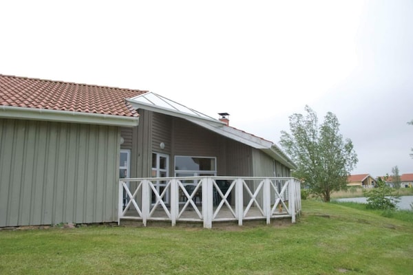 Luxe Scandinavisch vakantiehuis met privézwembad aan het meer in Otterndorf - thumbnail 3