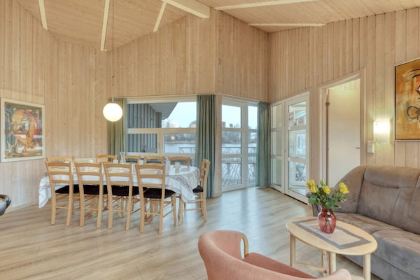 Luxe Scandinavisch vakantiehuis met privézwembad aan het meer in Otterndorf - thumbnail 1