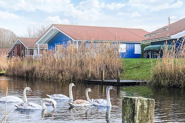 Luxe Scandinavisch vakantiehuis met privézwembad aan het meer in Otterndorf - thumbnail 4