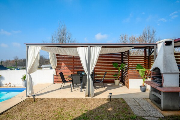Knus appartement Rose II nabij Poreč met tuin en barbecue - thumbnail 4