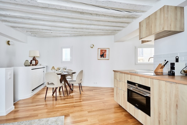 Elegant appartement in hartje Saint-Germain-des-Prés met zicht op de Seine - thumbnail 2