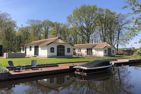 Knus boerderijchalet aan het water in Sint Nicolaasga - thumbnail 5