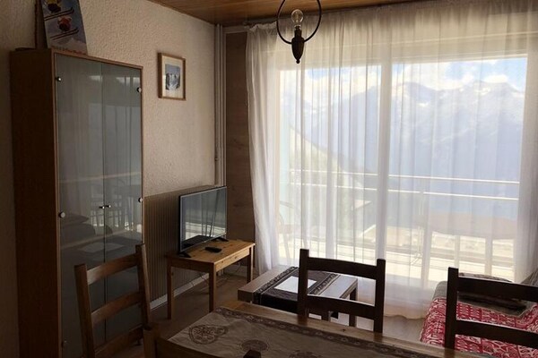 Knusse studio op de piste in Huez – 4 persoons appartement met balkon - thumbnail 1