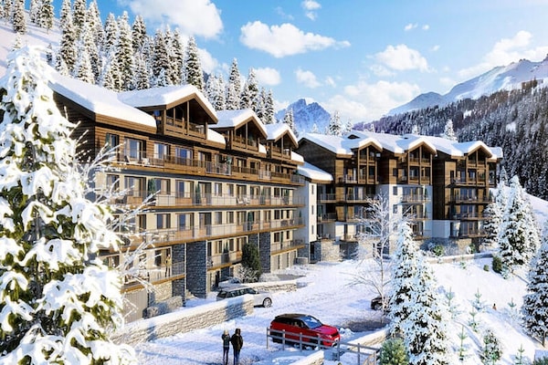 Penthouse in Courchevel Moriond met spabad, houtkachel en uitzicht - thumbnail 1
