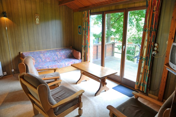 6-persoons houten bungalow in groen Jupille met hondvriendelijk terras - thumbnail 2