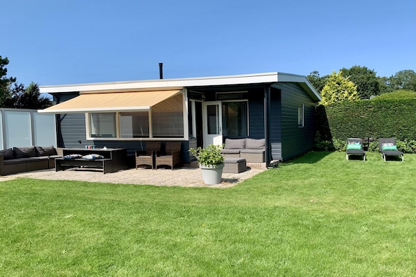 Vrijstaande kustbungalow Eureka 34 in groene omgeving - thumbnail 1