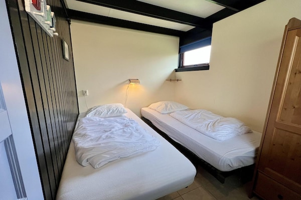 Sfeervolle vrijstaande bungalow met omheinde tuin in Sint Maartenszee - thumbnail 5