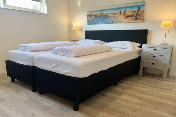 Vrijstaande vakantiebungalow met veranda en omheinde tuin in Sint Maartenszee - thumbnail 5