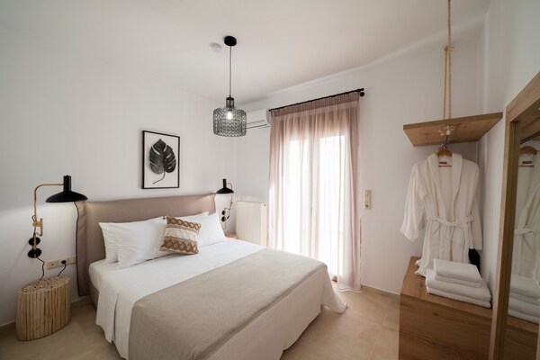 Zen Chic in Nea Magnisia: Appartement met zwembad en zeezicht - thumbnail 4