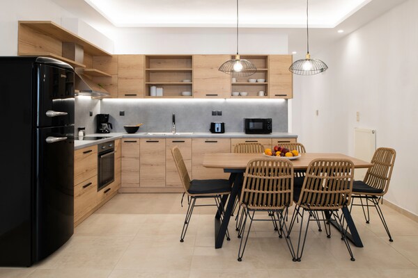 Zen Chic in Nea Magnisia: Appartement met zwembad en zeezicht - thumbnail 3