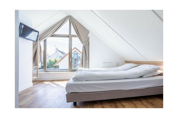 Modern vakantiehuis met zeeënboulevard op loopafstand in Noordwijk - thumbnail 4